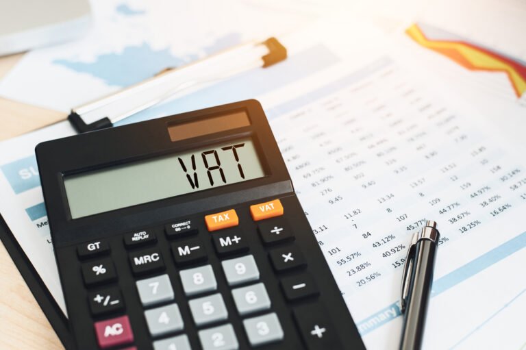 vat concept displayed on a calculator to Business and tax concept