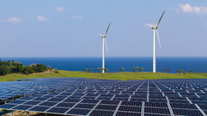 Solar panels and wind turbines illustrating renewable energy advancements, a key focus in Indonesia Industrial Growth in 2025.