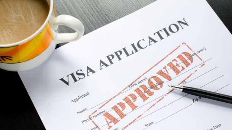Visa application form stamped 'Approved' representing the successful approval of a visa for diaspora Indonesia.