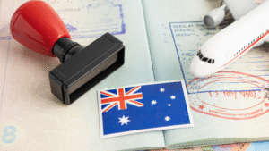 Indonesia visa for Australian concept with Australian flag, passport stamps, entry stamp, and travel essentials like a plane and visa stamp.