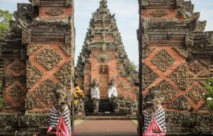 Entrance gate of Pura Puseh Desa Batuan, a traditional Balinese temple in Gianyar, showcasing intricate carvings and cultural heritage often admired by those living in Gianyar as expats.