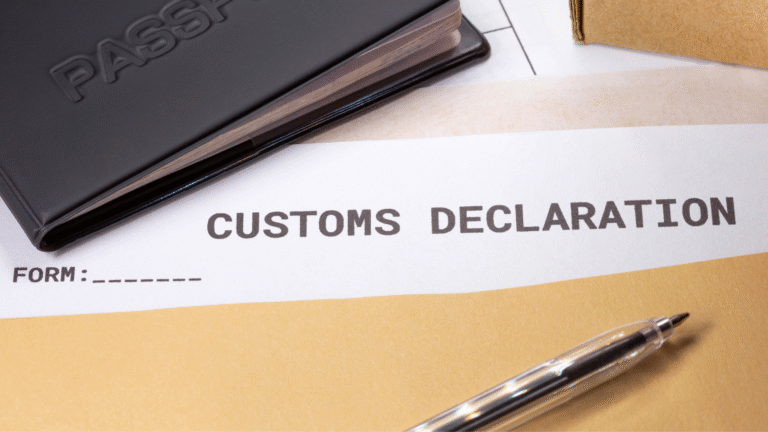 Indonesia Customs Declaration Form with passport and pen placed on top of travel documents.