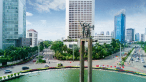 Bundaran HI in Central Jakarta, the center of Indonesia’s economic activity, surrounded by skyscrapers and busy roads, symbolizing the cost of starting a business in Indonesia.