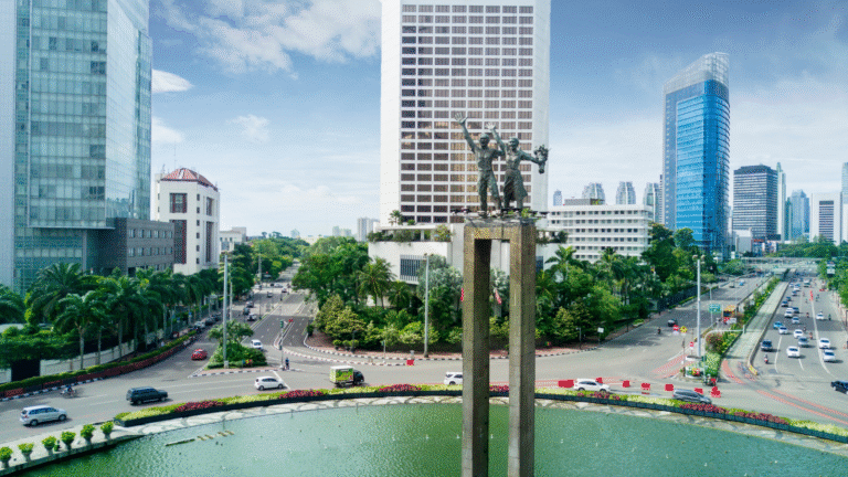 Bundaran HI in Central Jakarta, the center of Indonesia’s economic activity, surrounded by skyscrapers and busy roads, symbolizing the cost of starting a business in Indonesia.
