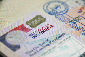 A close up of a Visa on Arrival from the Republic of Indonesia with date of issue and validity symbolizing compliance and to not overstay visa in Indonesia.