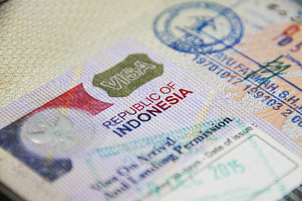 A close up of a Visa on Arrival from the Republic of Indonesia with date of issue and validity symbolizing compliance and to not overstay visa in Indonesia.