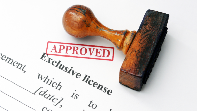 Approved stamp on a business document symbolizing compliance and the process to renew the PT PMA license in Indonesia.