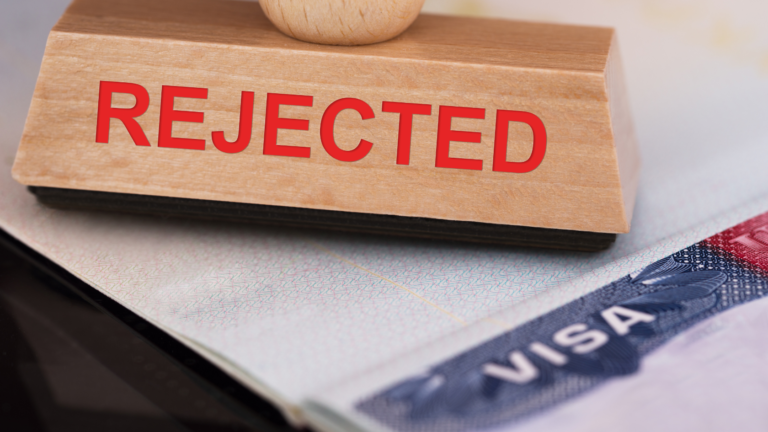 Rejected visa stamp on a passport, illustrating common Indonesia visa rejection reasons faced by foreign travelers.