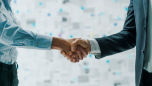 Two businessmen shaking hands signifying a potential business partner.