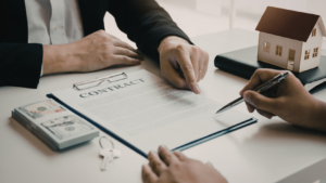 Signing a property purchase contract related to PPJB Indonesia during a real estate transaction.