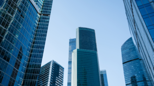 Modern glass skyscrapers in Jakarta’s central business district, representing corporate growth and business opportunities for PT PMA Indonesia companies.